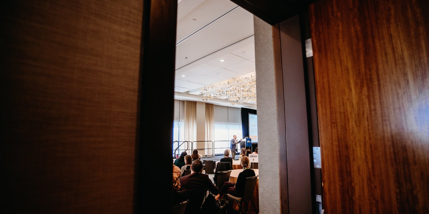 A leadership session in progress, seen from the doorway